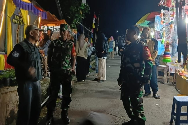 KORAMIL 18/PGT DAN POLSEK PGT MELAKSANAKAN PATROLI MALAM